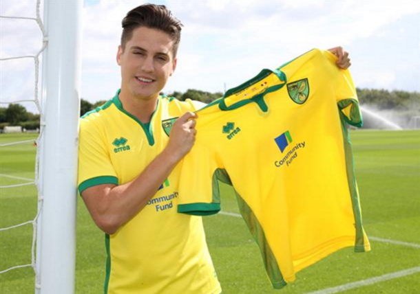 Canos pictured with a Norwich shirt shortly after confirming his move to the club. (Picture: Getty Images)