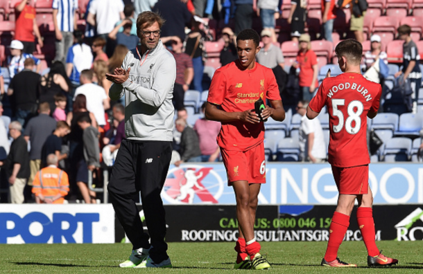 Klopp, Alexander-Arnold and Woodburn clap the Liverpool fans after full-time at Wigan. (Picture: Getty Images)