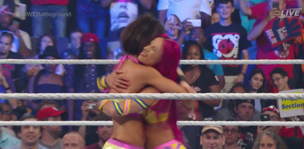 Sasha and Bayley embrace following their victory (image: WWE Network)