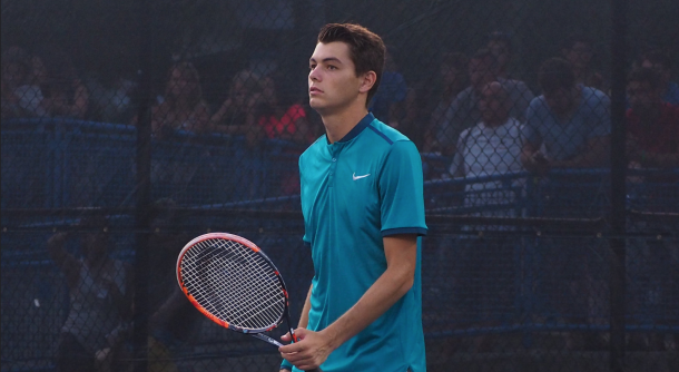 Taylor Fritz awaiting at the net during his doubles match with partner Reilly Opelka (not shown) at the Citi Open (Noel Alberto/VAVEL USA)