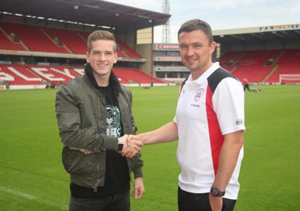 Kent with Barnsley boss Paul Heckingbottom after sealing his move. (Picture: Barnsley FC)