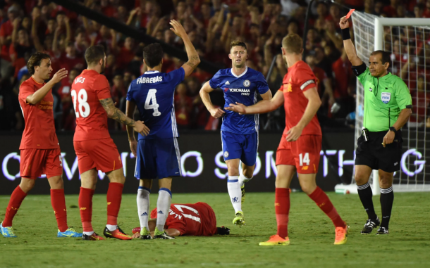 Fabregas receives a straight red card for lunging in on Klavan, down on the turf. (Picture: Yahoo Sports)