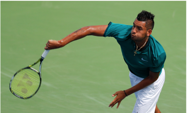 Kyrgios hits one of his 16 aces of the match. Credit: Kevin Cox/Getty Images