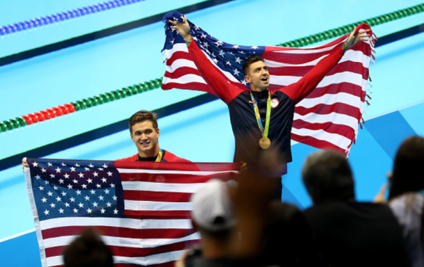 Ervin (R) and Adrian (L) celebrate their medals after the 50 free (Ryan Pierse/Getty Images)
