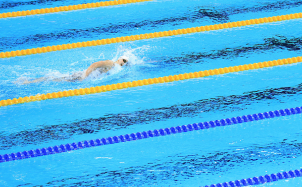 Ledecky swimming her way to a first Olympic record in the qualifying (Vaughn Ridley/Getty Images)