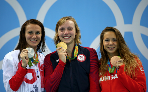 Carlin, Ledecky, and Kapas with their medals (Clive Rose/Getty Images)