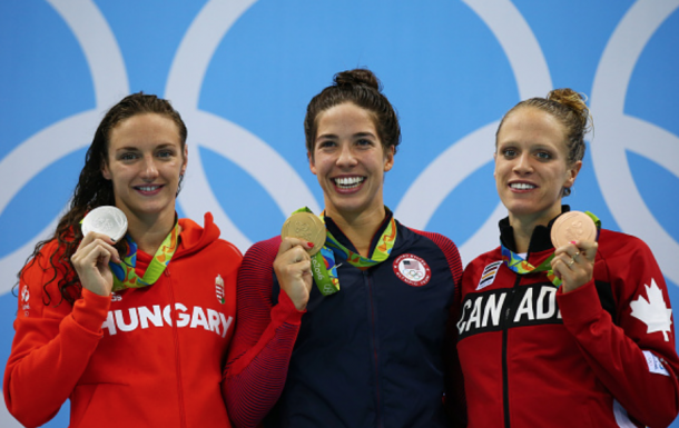 Hosszu, DiRado, and Caldwell with their medals (Clive Rose/Getty Images)