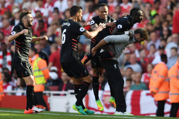 Mane and his teammates celebrate with Klopp after making it 4-1. (Picture: Getty Images)