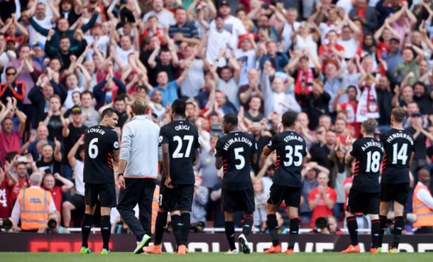 Klopp's Liverpool players thank their travelling supporters after full-time. (Picture: Getty Images)