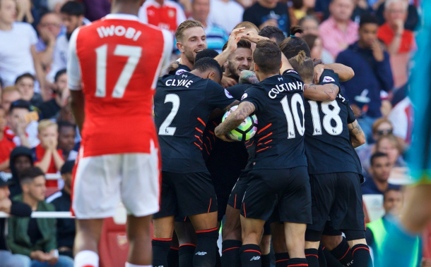 The Liverpool players celebrate Lallana's strike to make it 2-1. (Picture: Getty Images)