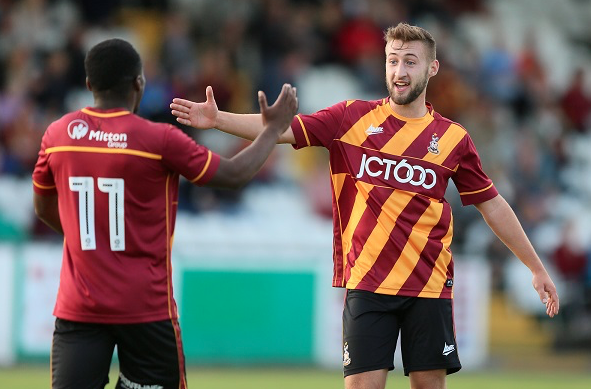 Vincent Rabiega (right) celebrates after scoring against Bradford Park Avenue. (Photo: Bradford City AFC)