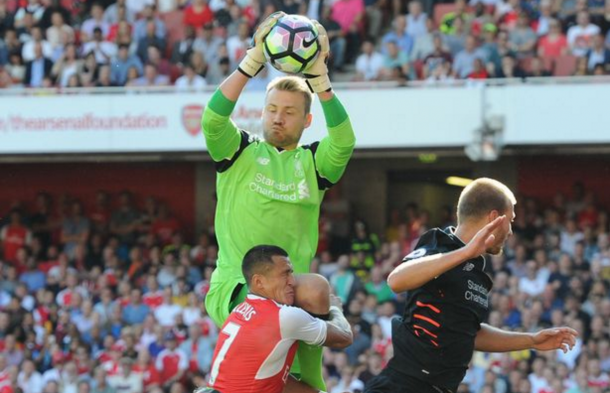 Mignolet comes out to claim a cross at the Emirates on Sunday. (Picture: Liverpool Echo via Getty Images)