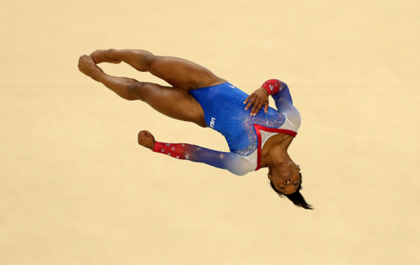 Biles performing a tumbling pass (Dean Mouhtaropoulos/Getty Images)