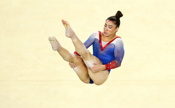 Raisman doing a tumbling pass in her floor routine (Dean Mouhtaropoulos/Getty Images)