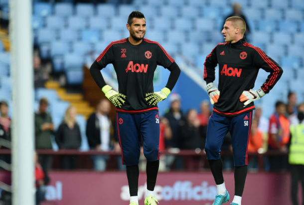 Romero and Johnstone (R) warming up before last season's Premier League against Aston Villa (Michael Regan/Getty)