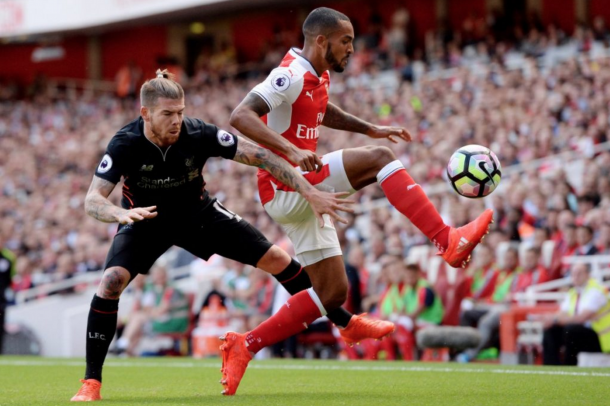 Moreno battles with goalscorer Walcott at the Emirates. (Picture: Getty Images)