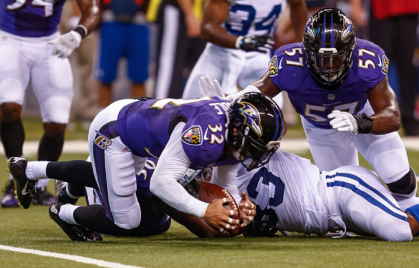 Eric Weddle recovers a fumble (Photo: Getty Images)