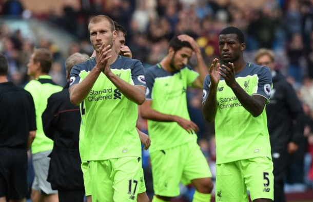 Ragnar Klavan and Georginio Wijnaldum clap the travelling Kop. (Picture: Getty Images)