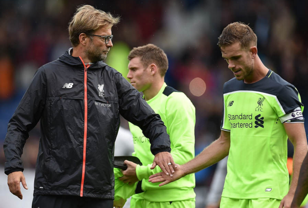 Klopp consoles captain Jordan Henderson after the full-time whistle. (Picture: Getty Images)