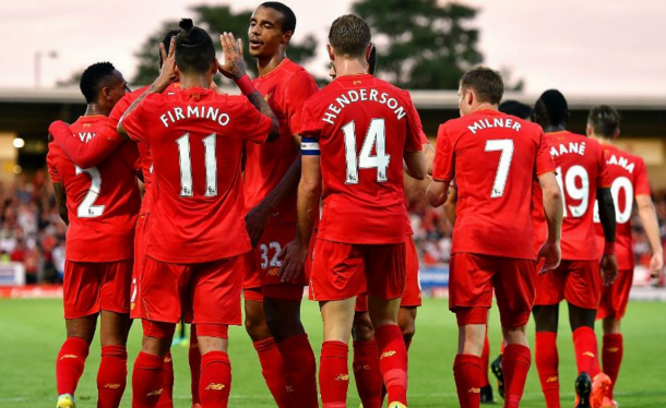 The Liverpool squad celebrate together after Firmino's header made it 2-0. (Picture: Liverpool FC via Getty Images)