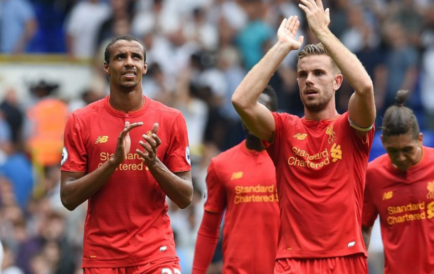 Matip joins his teammates to thank the away supporters after full-time. (Picture: Getty Images)