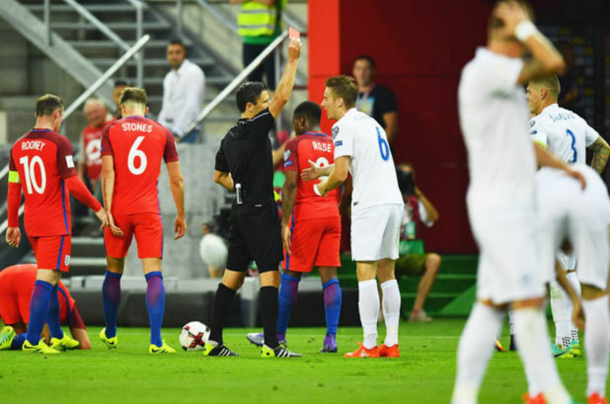 Skrtel sees red for a dangerous challenge on Kane. (Picture: Getty Images)