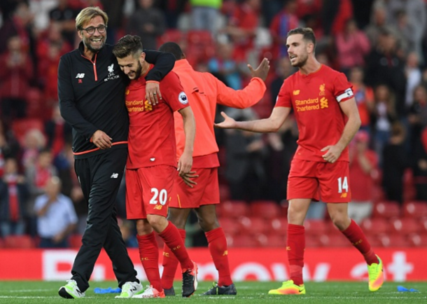 Klopp celebrates with his players after full-time. (Picture: Getty Images)