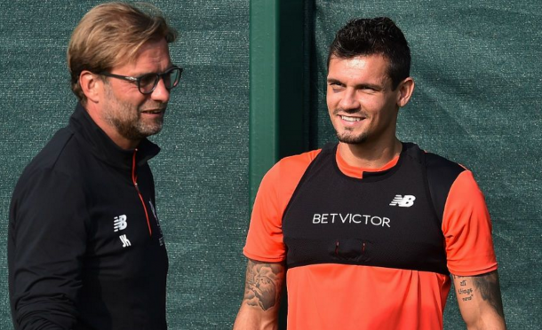 Lovren in Liverpool training on Friday, still showing signs of his eye injury. (Picture: Getty Images)