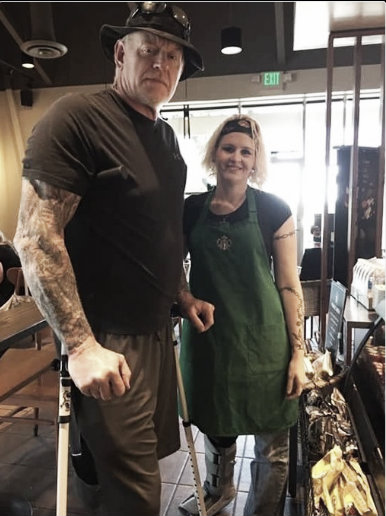 The Undertaker was snapped needing crutches to get around (image: twitter.com)