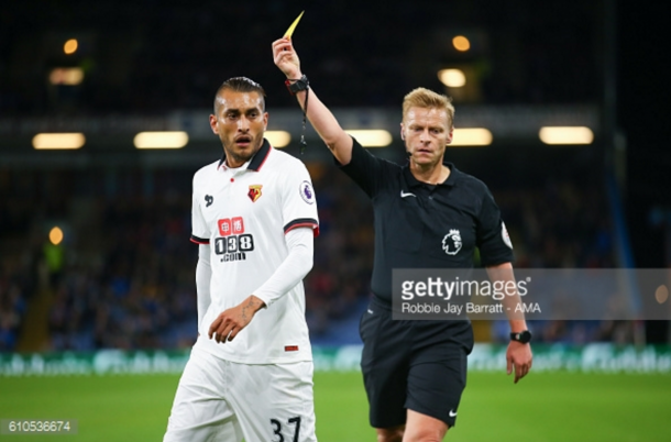 Pereyra receives a yellow card earlier in the campaign. (Picture: Getty Images)