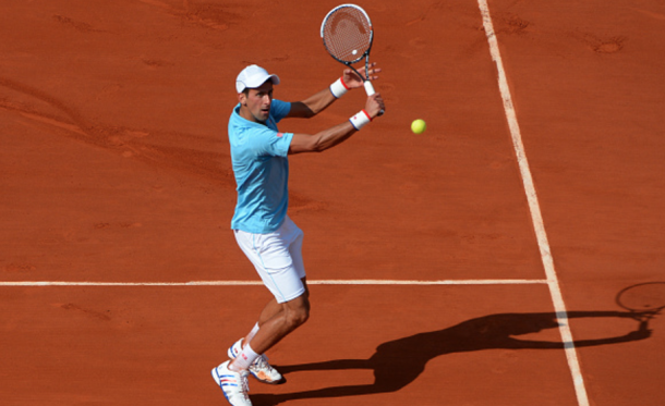 Once again, the light colors of Djokovic's outfit work lovely with the red clay (Ilewig Christian/Getty Images/Action Sport)