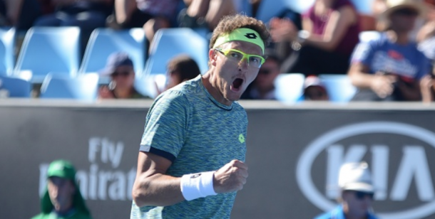 Denis Istomin celebrates his win over Pablo Carreno Busta (Anadolu Agency/Getty Images)