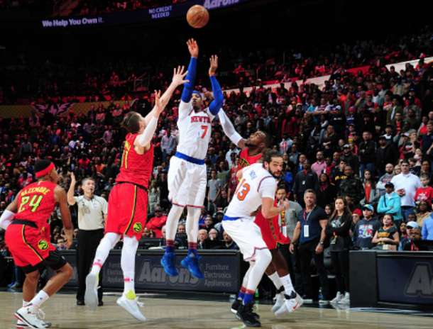 Carmelo Anthony let it fly on Sunday afternoon, but his team couldn't quite get the job done. (Photo by Scott Cunningham/Getty Images)