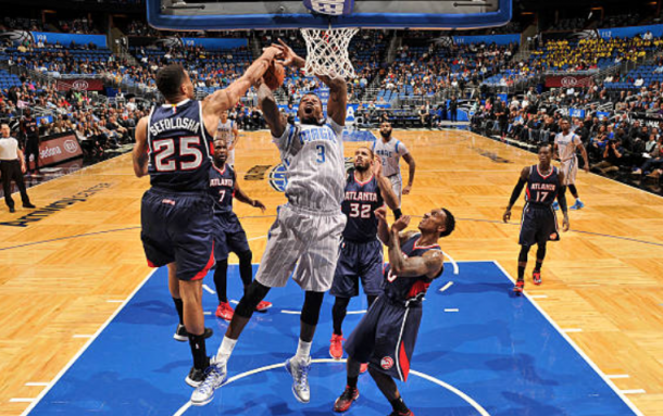 Dedmon playing against the Hawks as a member of the Orlando Magic in 2014. (Photo by Fernando Medina/Getty Images)