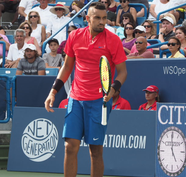 Kyrgios looks on in his match vs Dimitrov 