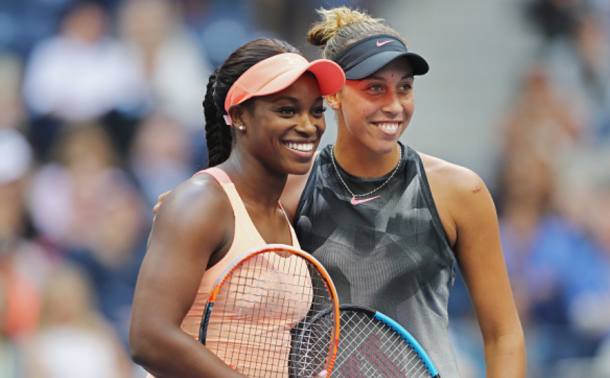 Keys and Stephens all smiles as they meet at the net for the traditional pre-match photos (Elsa/Getty Images)