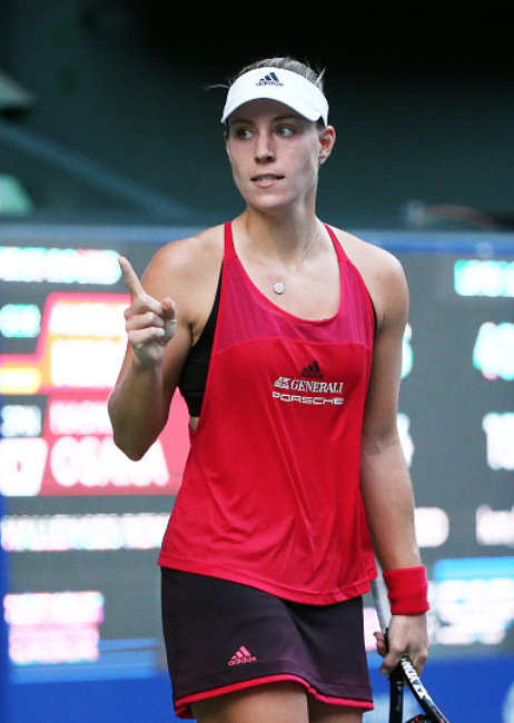 Kerber reacts to taking the opening set against Osaka (Koji Watanabe/Getty Images)