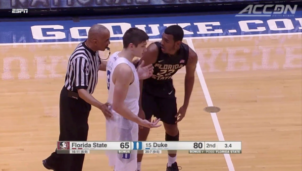 The ref talks to Allen after tripping Rathan-Mayes of Florida State