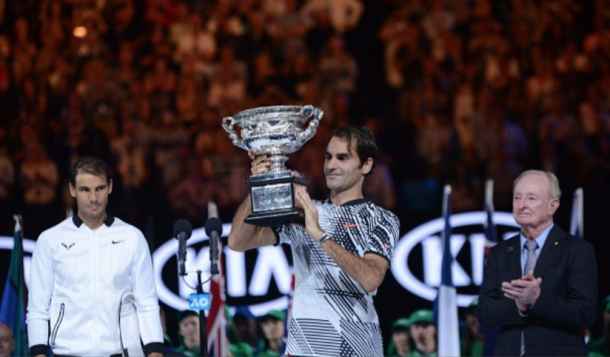 Nadal looks on as Federer lifts the Australian Open title (Anadolu Agency/Getty Images)