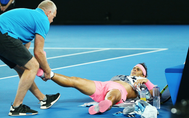 Nadal getting checked out by the trainer (Michael Dodge/Getty Images)