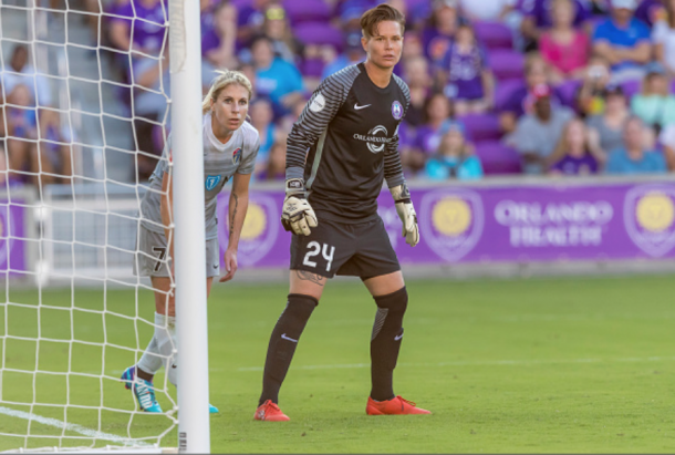 Orlando Pride goalkeeper Ashlyn Harris (24) defends her goal against McCall Zerboni (7) of the Carolina Courage. (Photo by Andrew Bershaw/Icon Sportswire via Getty Images)