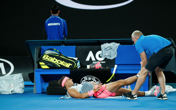 Nadal being treated by the trainer at the Australian Open (Icon Sportswire/Getty Images)