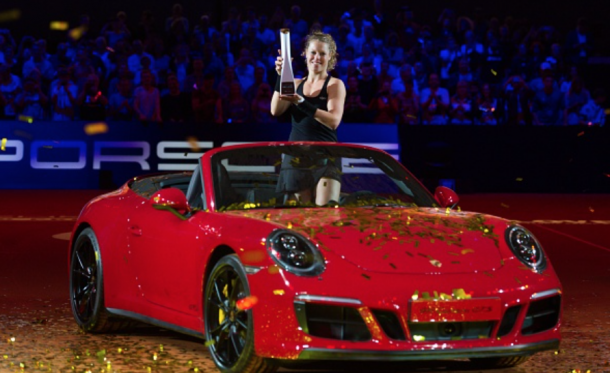 Laura Siegemund lifts her title in a Porsche (Anadolu Agency/Getty Images)