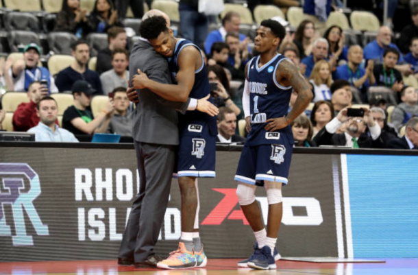 Hurley hugs Rhode Island's seniors as they're taken off in the final minutes vs Duke (Rob Carr/Getty Images)