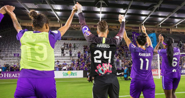 From left to right: Polina (19), Harris (24), Krieger (11) and Ubogagu (6) salute Orlando Pride supporters | Photo: Orlando Pride