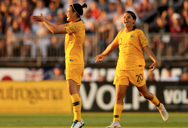 Chloe Logarzo and Sam Kerr celebrate Logarzo's goal against the USWNT. (Photo by Elsa/Getty Images)