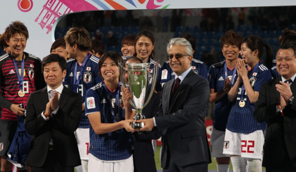 Japan celebrate with the AFC Asian Cup trophy with the win over Australia in April. (Photo by Shadi Nsoor/Anadolu Agency/Getty Images)