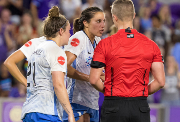 Carli Lloyd argues the red card she earned with the referee. (Photo by Andrew Bershaw/Icon Sportswire via Getty Images)