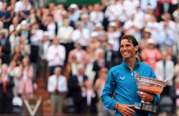 Nadal all smiles after finishing his clay season with yet another French Open crown