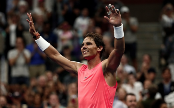 Rafael Nadal smiles after winning the match (Anadolu Agency/Getty Images)